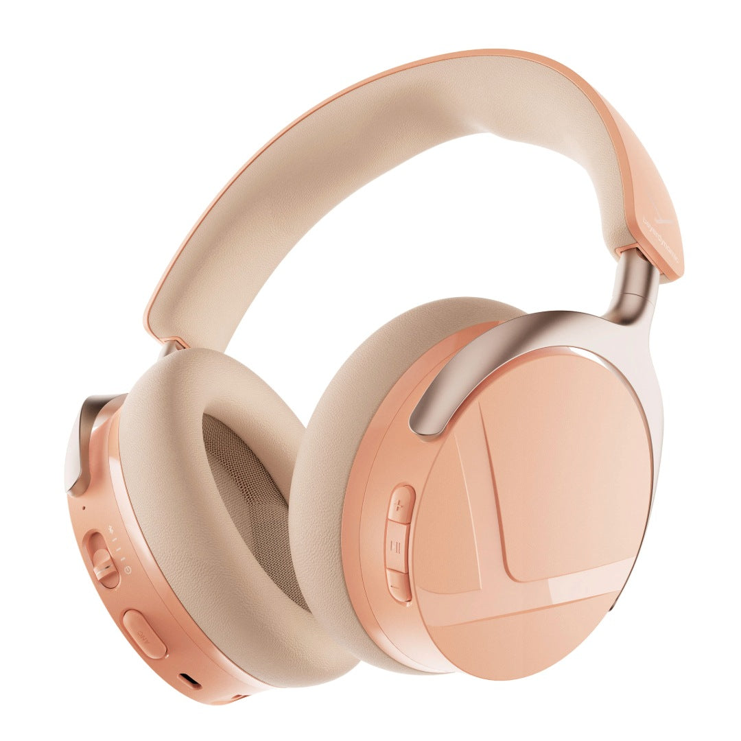 Over-ear wireless headphones in a soft peach and beige colorway, 